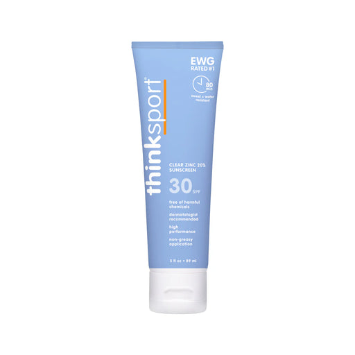 a tube of tinted sunscreen on a white background