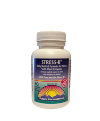 a bottle of stress - b tablets on a black background