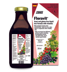 a bottle of floravit next to a box of liquid