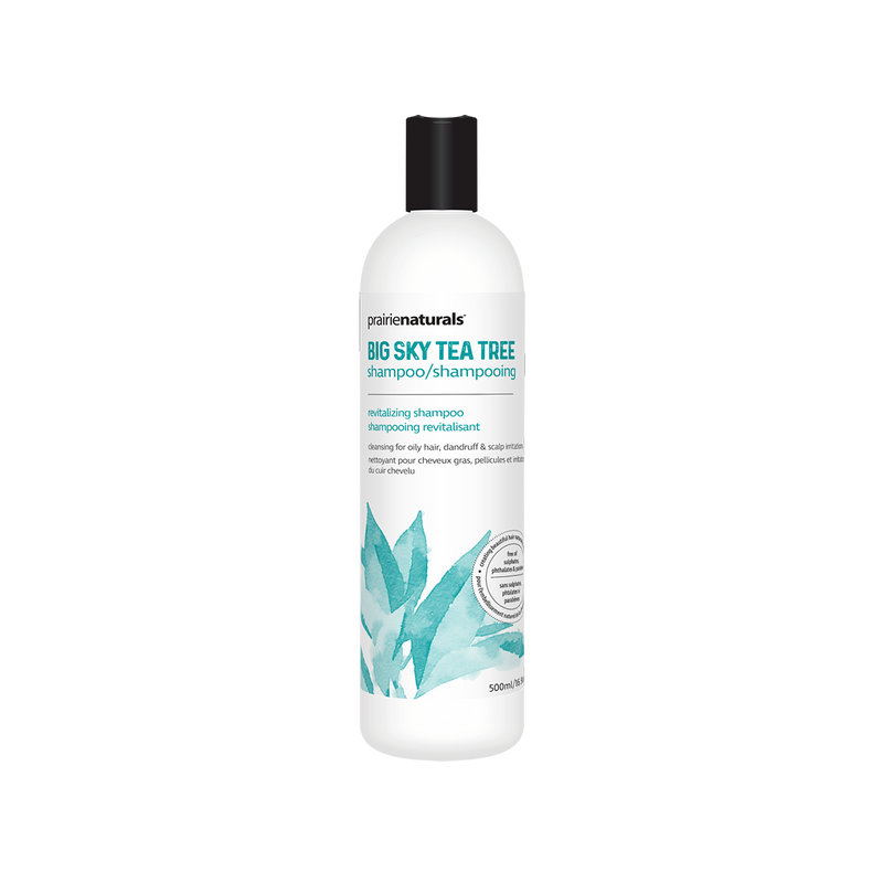 a bottle of tea tree shampoo on a white background