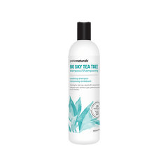 a bottle of tea tree shampoo on a white background