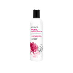 a bottle of wild rose conditioner on a white background