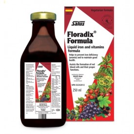 a bottle of floadix formula next to a box of vitamins