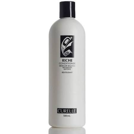 a bottle of curl on conditioner on a white background